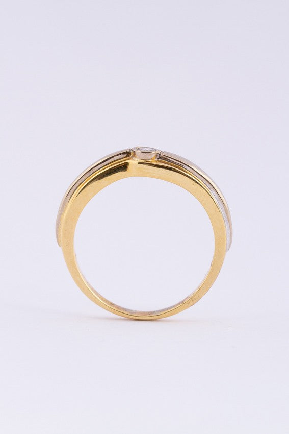 White/yellow gold ring with a brilliant