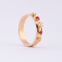 Gouden band ring met robijn en parels