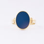 Gouden ring met blauw lagen steen
