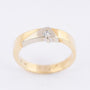Wit/geel gouden ring met een briljant