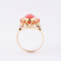Gouden entourage ring met bloedkoraal