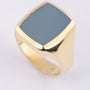 Gold men's ring with a blue layered stone
