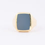 Gold men's ring with a blue layered stone