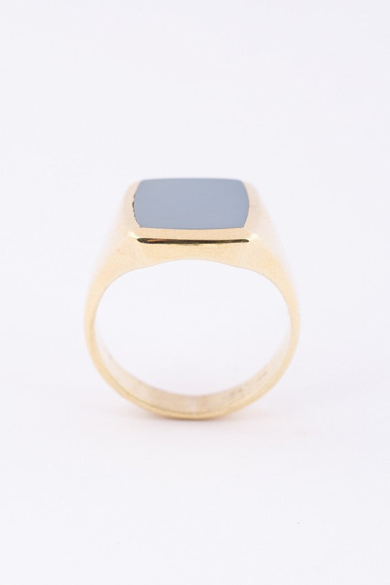 Gold men's ring with a blue layered stone