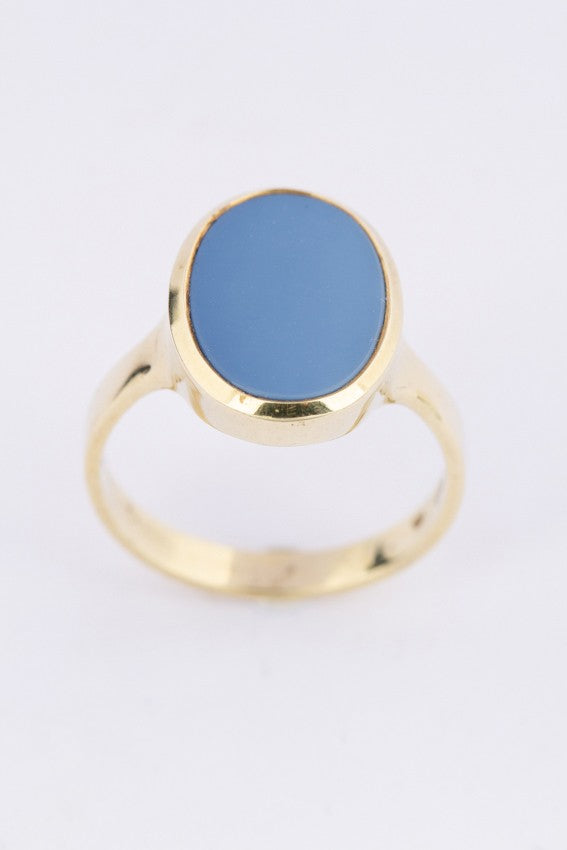 Gouden ring met blauw lagen steen