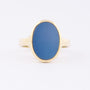 Gouden ring met blauw lagen steen