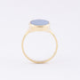 Gouden ring met blauw lagen steen