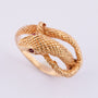Gold snake ring with rubies