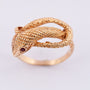 Gold snake ring with rubies