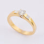 Gold ring with brilliant, round and princess cut diamonds