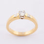 Gold ring with brilliant, round and princess cut diamonds