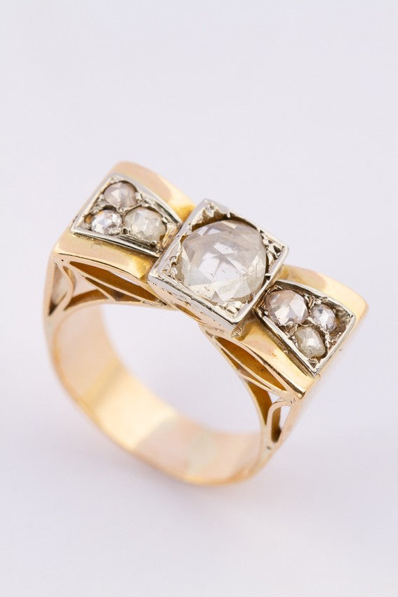 Gouden demodé (retro) strik ring met diamanten