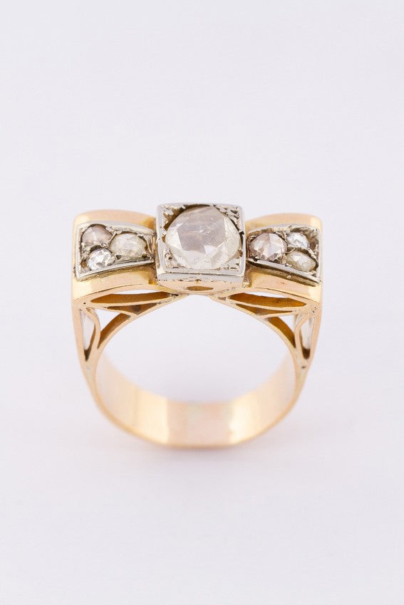Gouden demodé (retro) strik ring met diamanten
