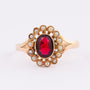 Antieke gouden entourage ring met parels en granaat
