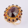 Gold ring with garnet