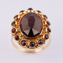 Gold ring with garnet
