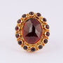 Gold ring with garnet