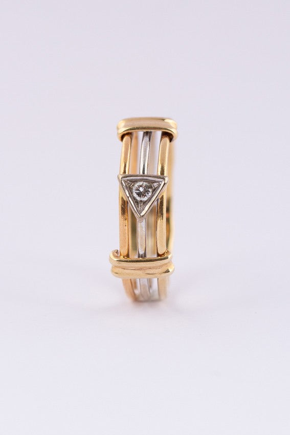 Wit/geel gouden spangen ring met een briljant