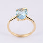 Gold ring with a topaz