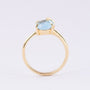 Gold ring with a topaz