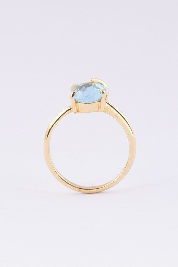Gold ring with a topaz