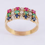 Gold triple row ring with sapphire, emerald, ruby ​​and diamonds