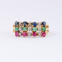 Gold triple row ring with sapphire, emerald, ruby ​​and diamonds