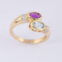 Gold ring with topaz, amethyst and diamonds