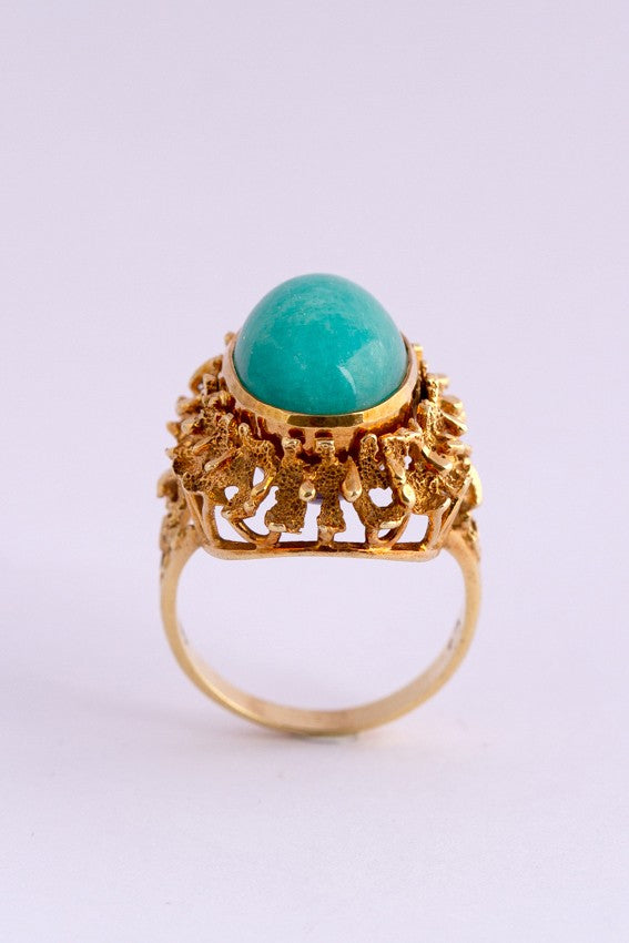 Gold ring with rotating interchangeable amethyst/amazonite stone