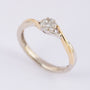 White/yellow gold ring with diamonds set in pavé