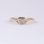 White/yellow gold ring with diamonds set in pavé