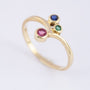 Gouden ring met smaragd, saffier en robijn