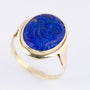 Gold ring with cut lapis lazuli