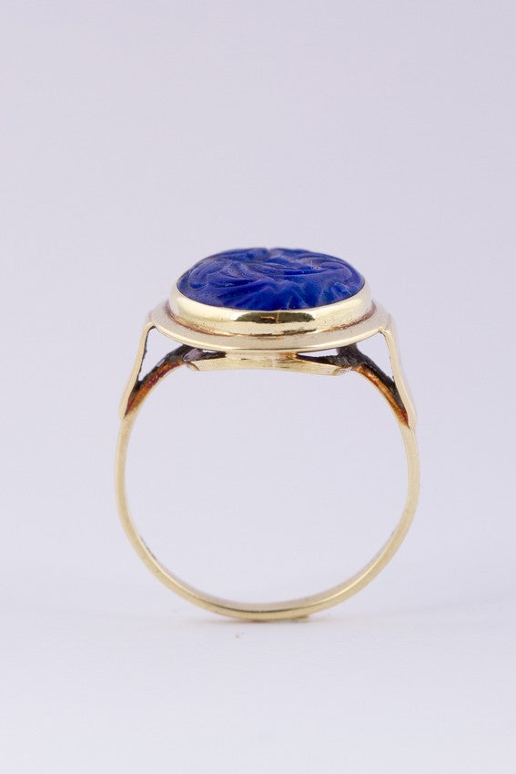 Gold ring with cut lapis lazuli