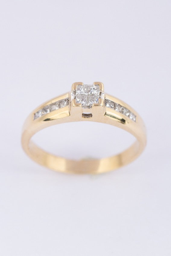 Gold ring with princess cut diamonds