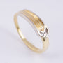 14 carat white/yellow gold ring with a 0.025 ct brilliant