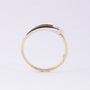 14 carat white/yellow gold ring with a 0.025 ct brilliant