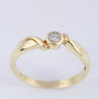 Gold ring with a brilliant