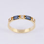 Gouden rij ring met saffieren en briljanten