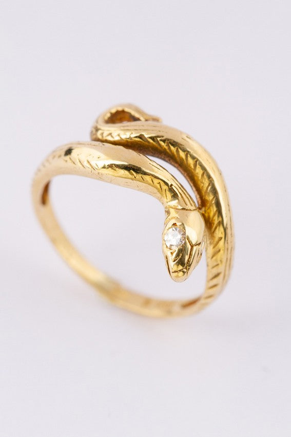 Gouden slangen ring met briljant