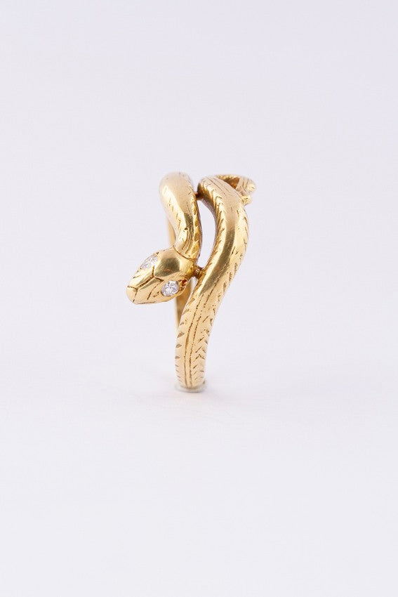 Gouden slangen ring met briljant