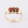 Gold ring with 3 garnets