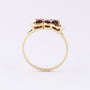 Gold ring with 3 garnets