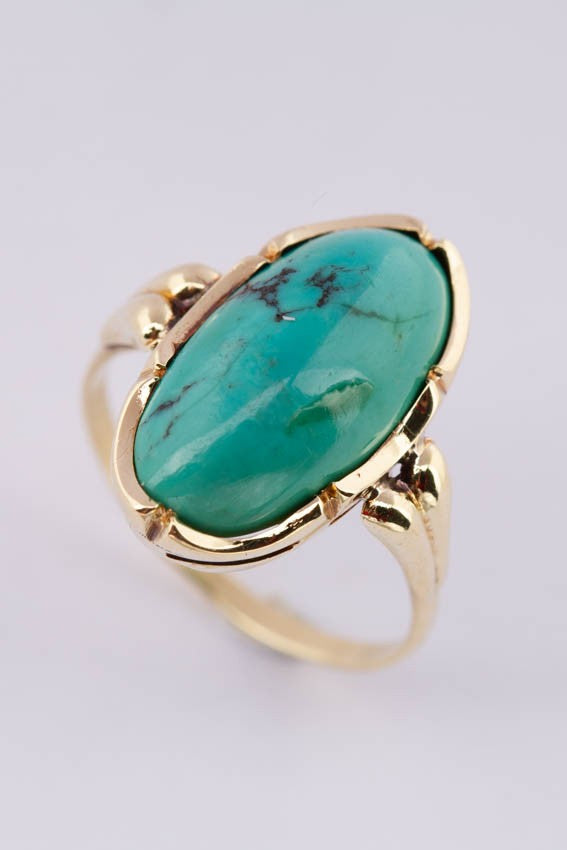 Gouden ring met een turkoois