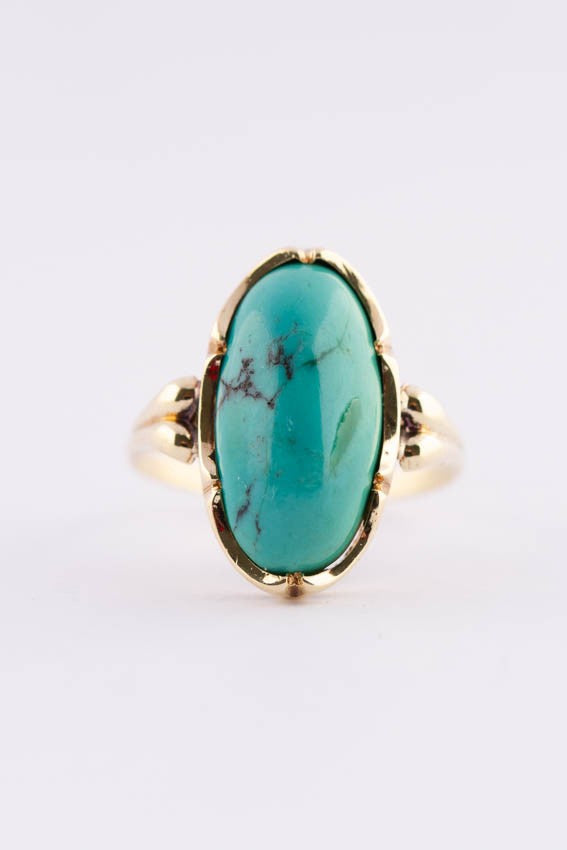 Gouden ring met een turkoois