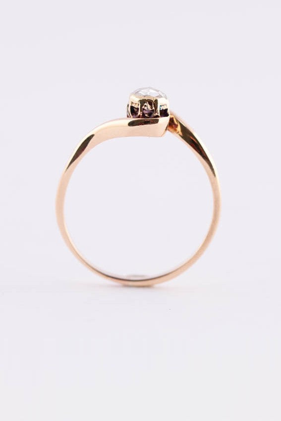 Antique gold ring with a diamond