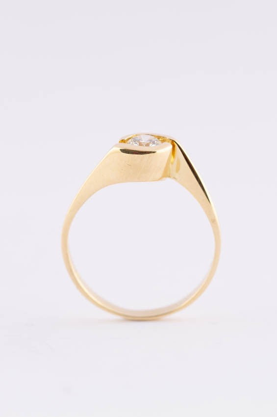 Gold solitaire ring with a brilliant (approx. 0.32 ct.)