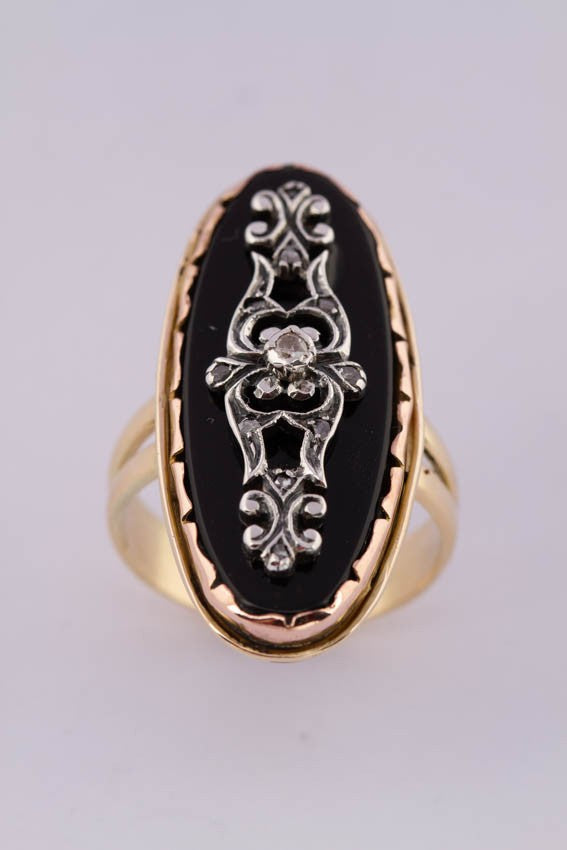 Gouden markies ring met onyx en diamanten