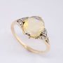 Gouden ring met vuur opaal en diamanten