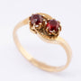 14 carat gold ring with two garnets